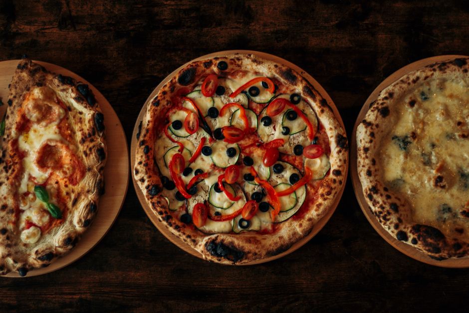 Artisan-style pizza fresh from wood-fired oven